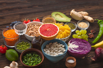Great set of healthy products on a wooden table. best vitamins for beautiful skin. Products with vitamins.