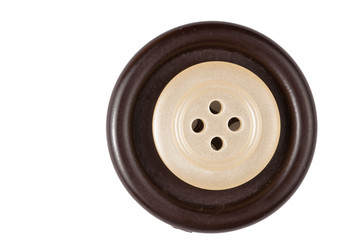 Clothes button isolated on white background. Copy space