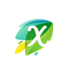 Letter X logo in dynamic leaves intersection shape.