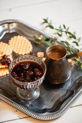 waffles with cherry jam and coffee