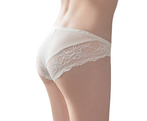 Back view of young slim woman in lace lingerie