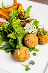 delicious falafel with salad and potatoes