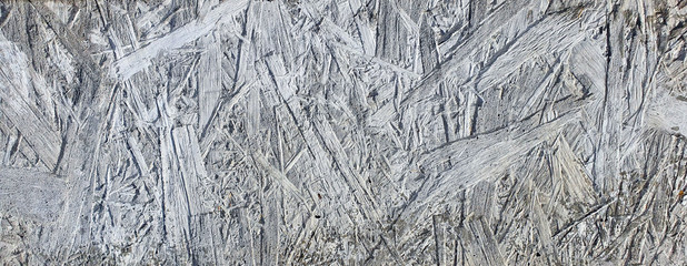 amazing background, imprint of a wooden texture on a concrete wall