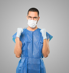 Coronavirus.Young man doing concepts and wearing mask and protective gloves