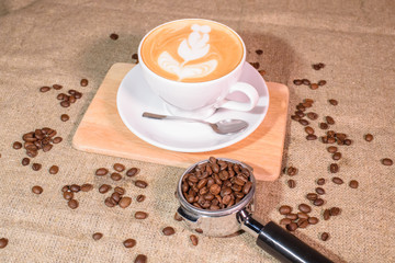Tasty fragrant caupchino on a canvas background. Near the Turk and the holder.