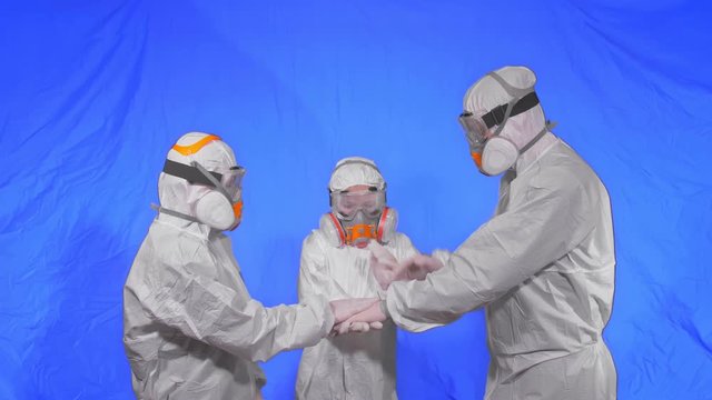 The family shield protect, to save life from virus. Slow motion. People portrait, wearing protect medical aerosol spray paint mask respirator. Concept health safety protection coronavirus epidemic.