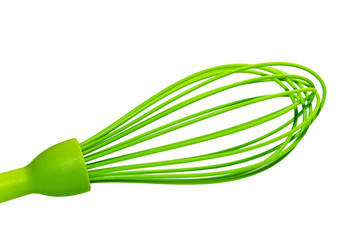 Green silicone culinary whisk for whipping isolated on a white background