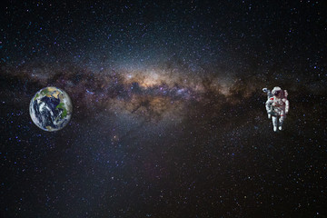 Astronaut in outer space. Elements of this image furnished by NASA.