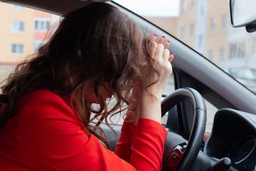 the girl is a driver, experiencing stress