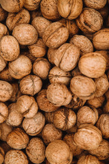 Lots of walnuts. Background and texture from the nuts. Close up.
