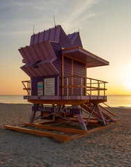Iconic Miami Beach lifeguard tower during sunrise.