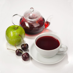 Fruit hot tea with the addition of cherry and apple