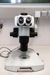 Laboratory microscope isolated on white close up