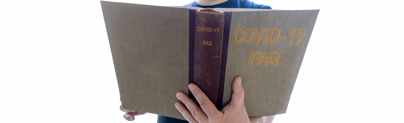 Man holds a book in his hands on questions and answers from covid-19. isolated white background with text space, Banner