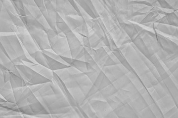 light background: Crumpled fabric, black and white, enhanced contrast