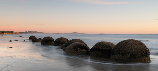 Moeraki Boulders at sunrise with a colourful sky, New Zealand © Sebastian