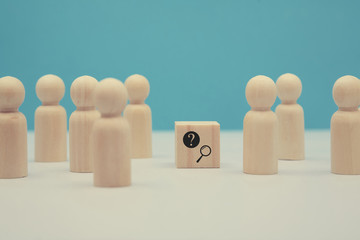 FAQ. Ask online. Frequently asked questions. Basic information. Wooden figures, question mark and...