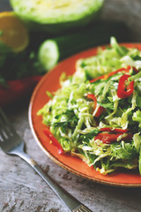 Healthy vitamin salad with fresh cabbage. Spring salad with cabbage and herbs. Healthy diet. Immunity diet.