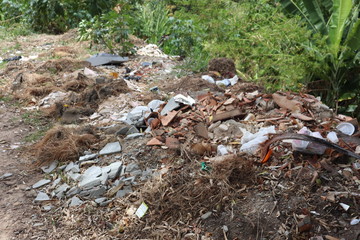 Naklejka na ściany i meble Domestic waste from the Brazilian slum.