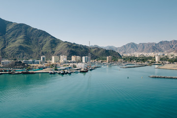 Fototapeta na wymiar Landscape view to Khorfakkan Port from cruise ship. Sharjah, UAE