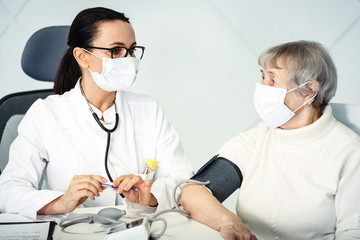 healthcare in hospital concept. female doctor consulting old lady