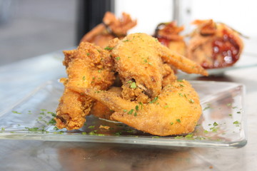 Fred Chicken Wings on a Glass Plate