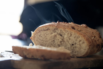 steaming hot homemade bread cut into slices