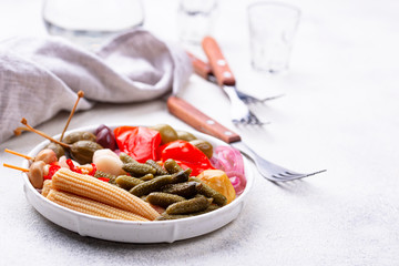Assortment of marinated or pickled vegetable.