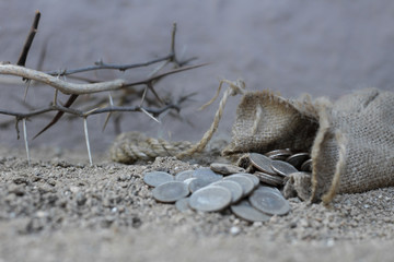 sack with the thirty silver coins biblical symbol of the betrayal of judas