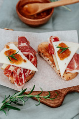 Chopping board of Cured Meat, Spanish Ham and Cheese and Olive