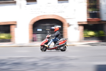 Fototapeta na wymiar boy on scooter