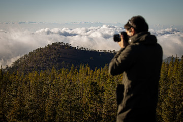 Photographer taking photos of a lovely landscape