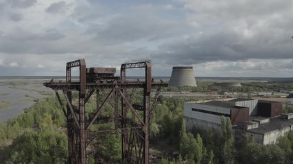 KP-640 crane. They load the reactors in the power units. Rusty tap. Near the city of Pripyat. Video from the drone. Unfinished 5th power unit of the Chernobyl nuclear power plant. Rare footage. Destru