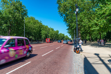 LONDON - JUNE 30, 2015: Traffic along The Mall road in summer season