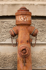 View of old weathered faded fire hydrant