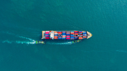Container ship, Business logistic import-export transport international and transportation of containers in port , Shipping container buildings, Aerial at night view of Shipping container worldwide