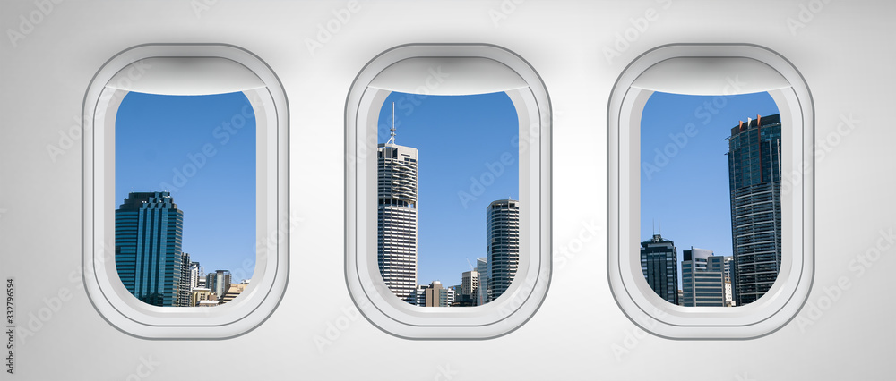 Poster Brisbane skyline as seen through airplane windows. Holiday and travel concept