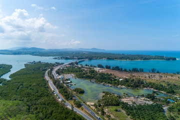 Fototapeta na wymiar Aerial View Drone shot of sarasin bridge Phuket thailand image transportation background Sarasin Bridge connect Phang Nga province to Phuket.