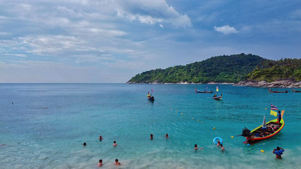 Obraz premium PHI PHI DON, THAILAND - DECEMBER 2019: Aerial view of beach and tourists
