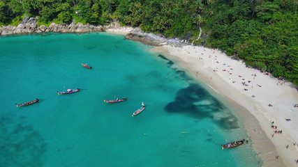 Aerial view of long tail boats along a tropical beach, Thailand