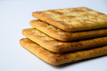 Close up healthy wheat cracker on white background. Cracker biscuit