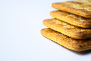 Close up healthy wheat cracker on white background. Cracker biscuit