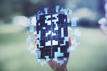 Double exposure of technology sketch hologram and woman holding and using a mobile device. Ai concept