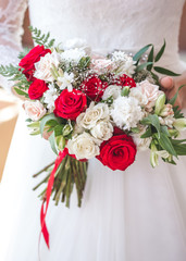 Wedding bouquet at bride's hands. Wedding concept