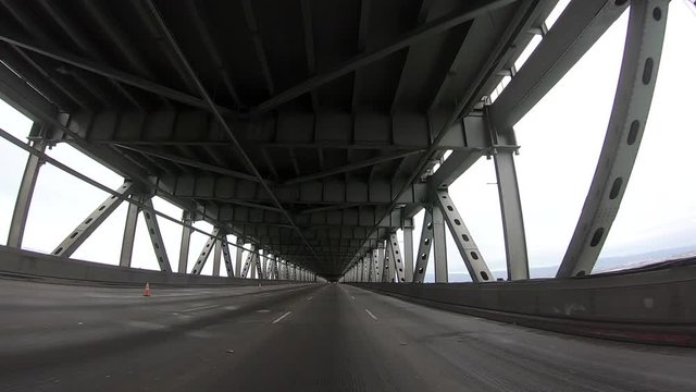 HD Video Driving POV on the lower deck of the Bay Bridge, no traffic, empty during the CoVID 19 pandemic mandated home isolation in the Bay Area.