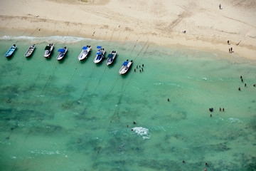 Aerial view of boats in Tulum beach