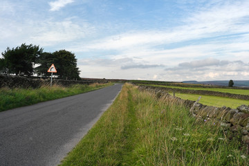 Fototapeta na wymiar Lonely country road near Eyam Derbyshire England