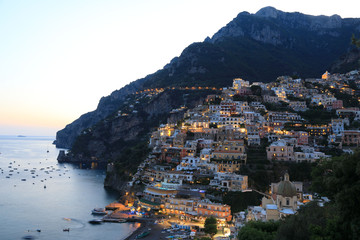Positano Village along Amalfi Coast in Italy at dusk
