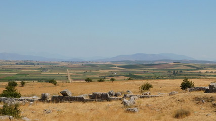 Fototapeta na wymiar View of the battlefield of the famous battle of Plataea, on 479 BC, where the Greeks defeated the Persians, and ruins of the ancient city, in Boeotia, Greece