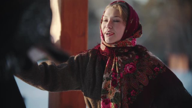 Russian folklore - Russian woman are smiling at the camera and dancing